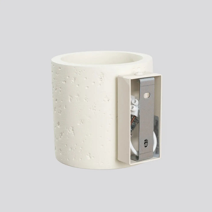 Applique orbis design contemporain en forme originale beige en béton texturé avec fixation métallique élégante