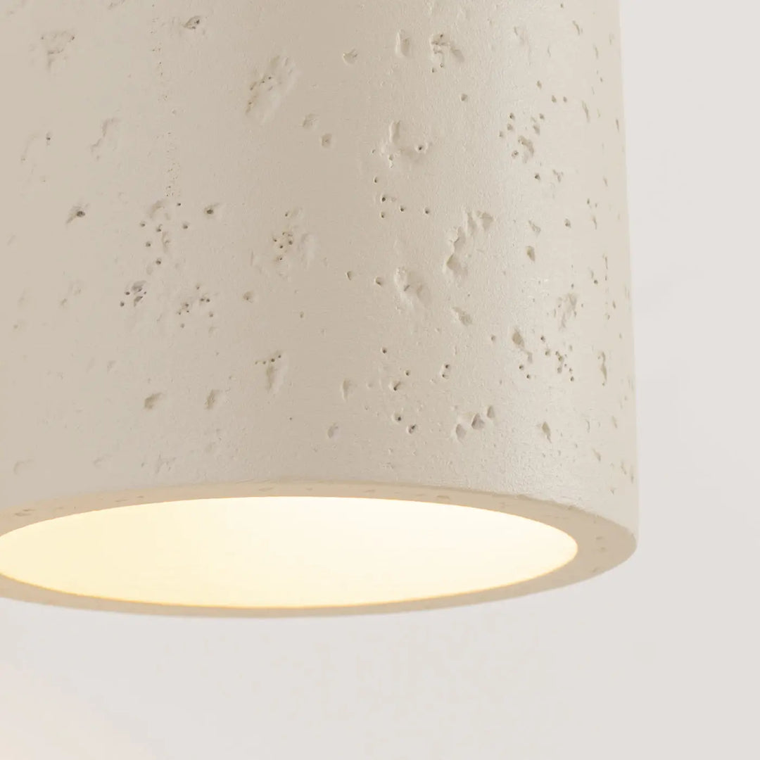 Applique orbis design contemporain forme originale en béton beige texturé avec lumière intérieure douce