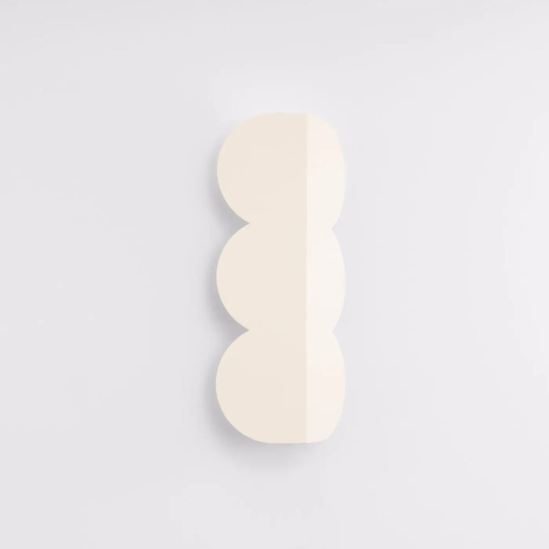 Applique murale biscuit beige avec luminaires biscuit allient forme ondulée caractéristique et caractère distinctif
