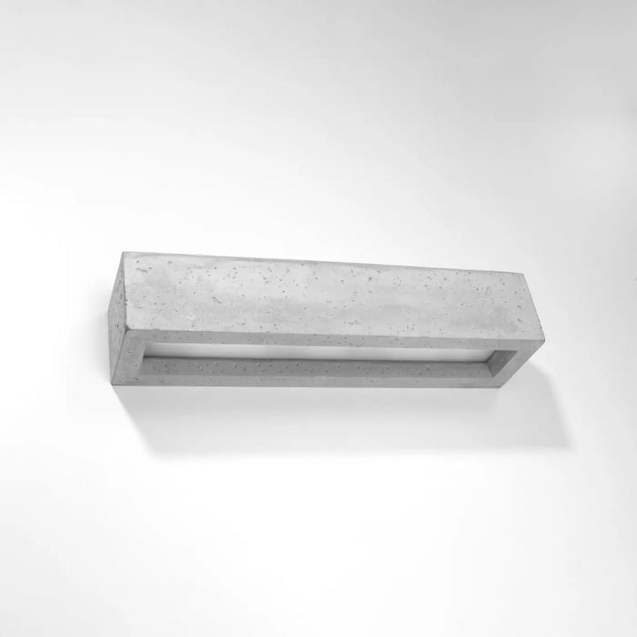 Applique murale vega 50 en béton moderne gris avec design minimaliste et lumière encastrée pour atmosphère harmonieuse