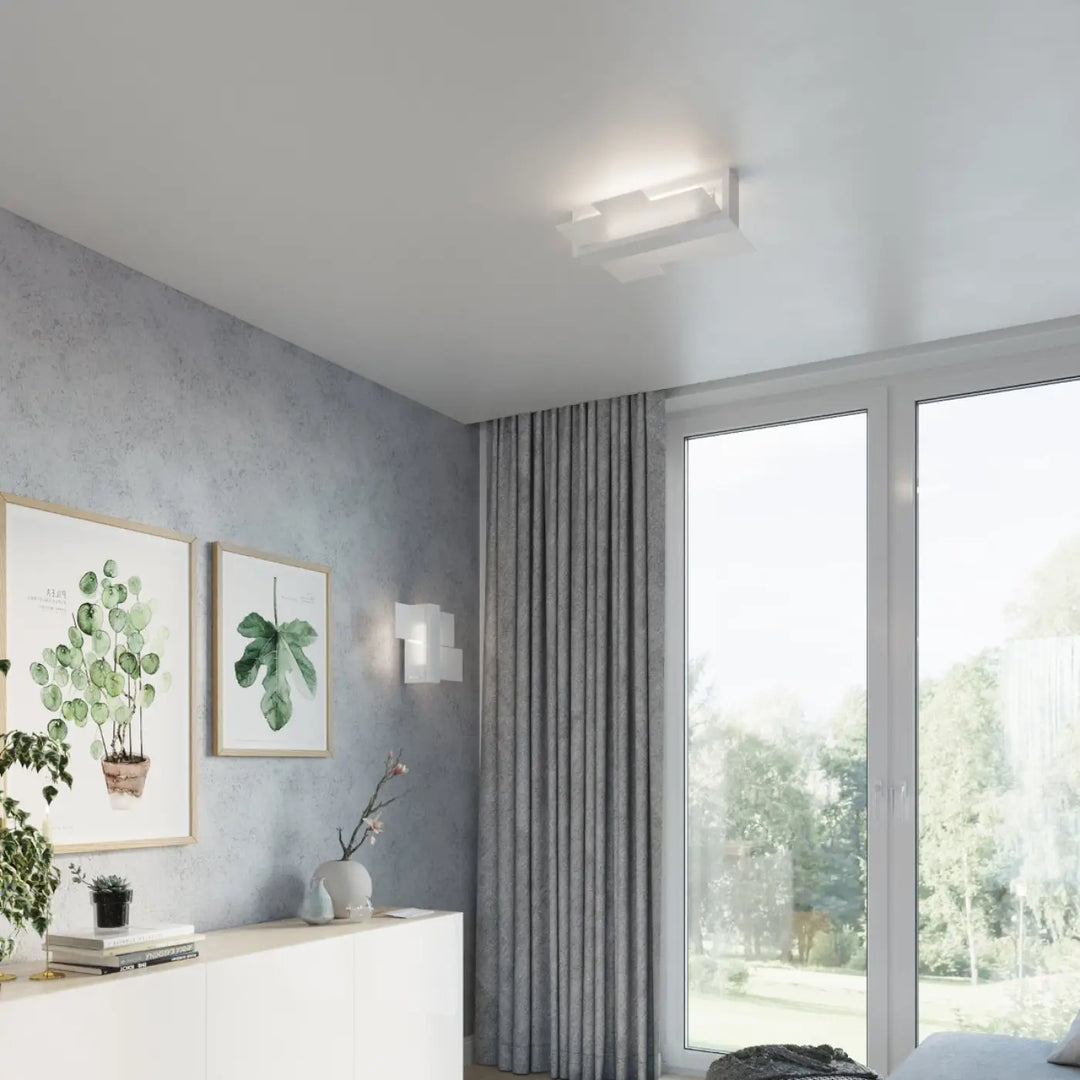 Applique murale feniks 1 blanc avec design intemporel pour créer une atmosphère unique et lampes surprenantes