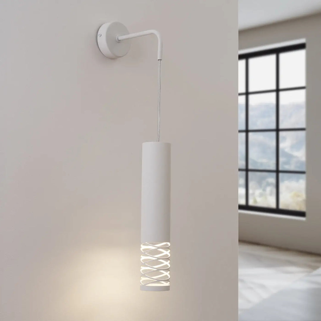 Applique murale lami blanc avec finition originale et effet visuel unique grâce aux découpes décoratives en spirale