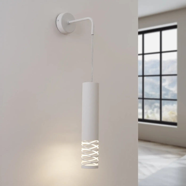 Applique murale lami blanc avec finition originale et effet visuel unique grâce aux découpes décoratives en spirale
