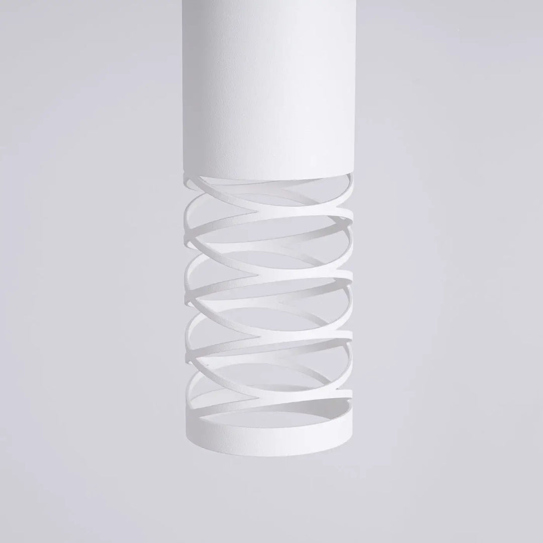 Applique murale lami blanc en forme cylindrique avec découpe en spirale pour un effet visuel unique et finition originale