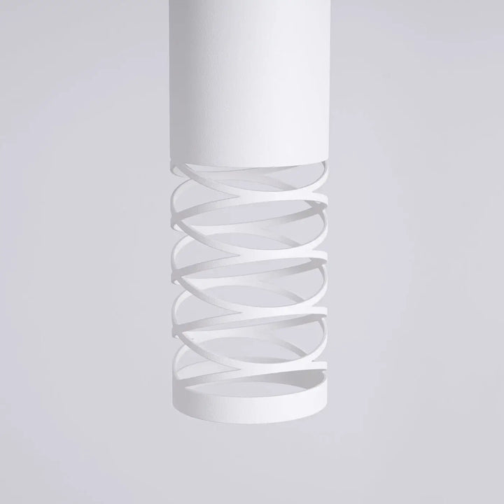 Applique murale lami blanc en forme cylindrique avec découpe en spirale pour un effet visuel unique et finition originale