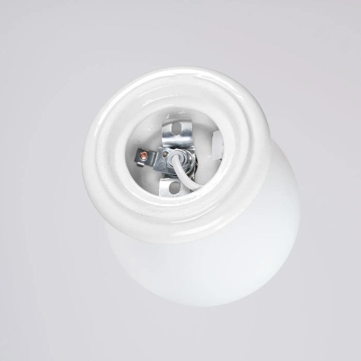 Dos de lampe zori applique murale blanc en céramique avec câblage métallique et borne centrale laiton pour belle décoration et qualités esthétiques