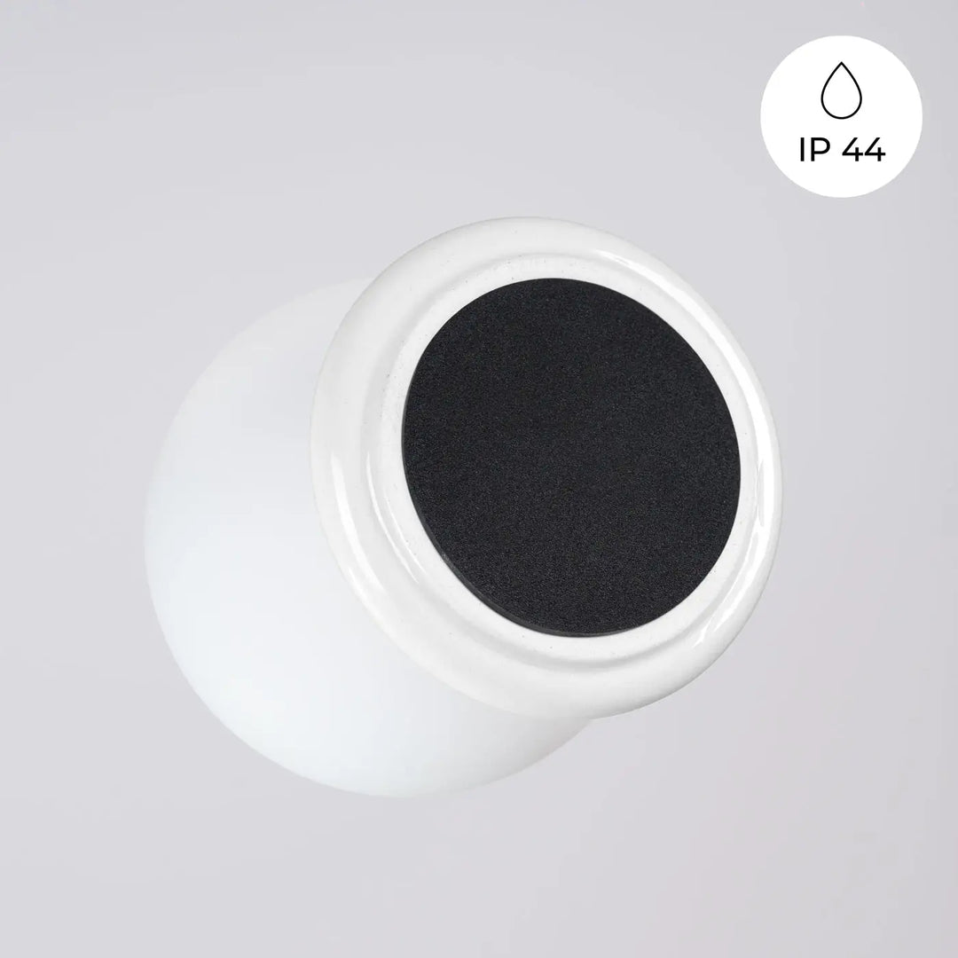 Applique murale zori blanc en céramique avec un couvercle circulaire texturé noir pour une belle décoration