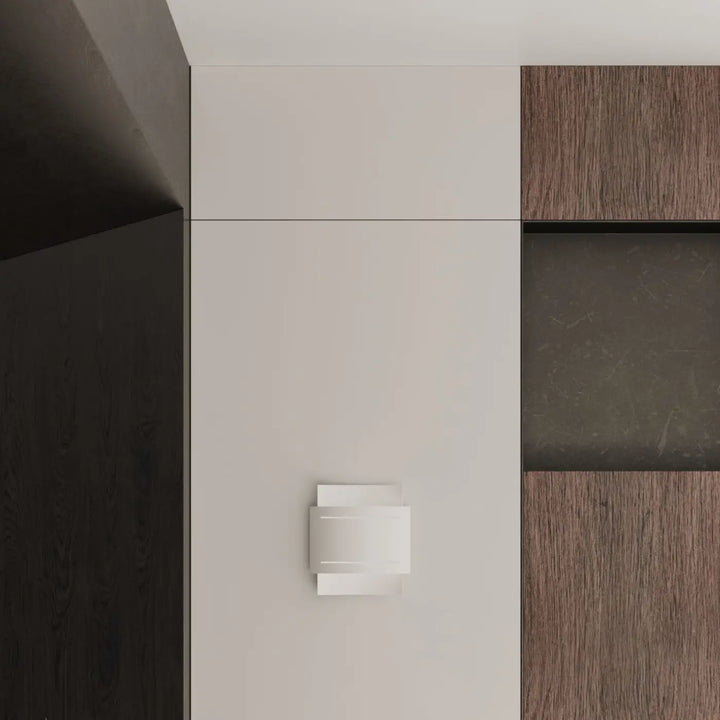 Applique murale hestia blanche minimaliste avec design original et forme géométrique pour un éclairage intemporel