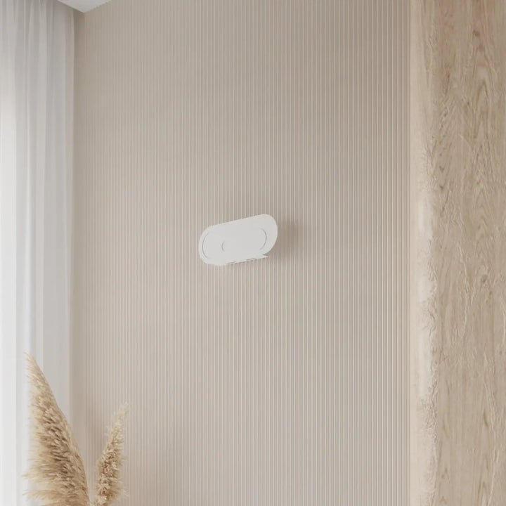 Applique murale blanche ovale saccon avec design minimaliste pour créer une atmosphère chaleureuse originale