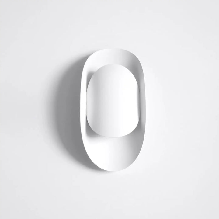 Applique murale tear blanc minimaliste avec design ovale épuré et finition mate l’applique murale tear offre des solutions surprenantes