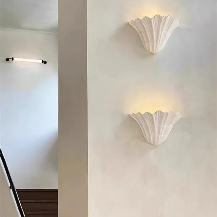 Applique murale blanche en forme de coquillage au style marin