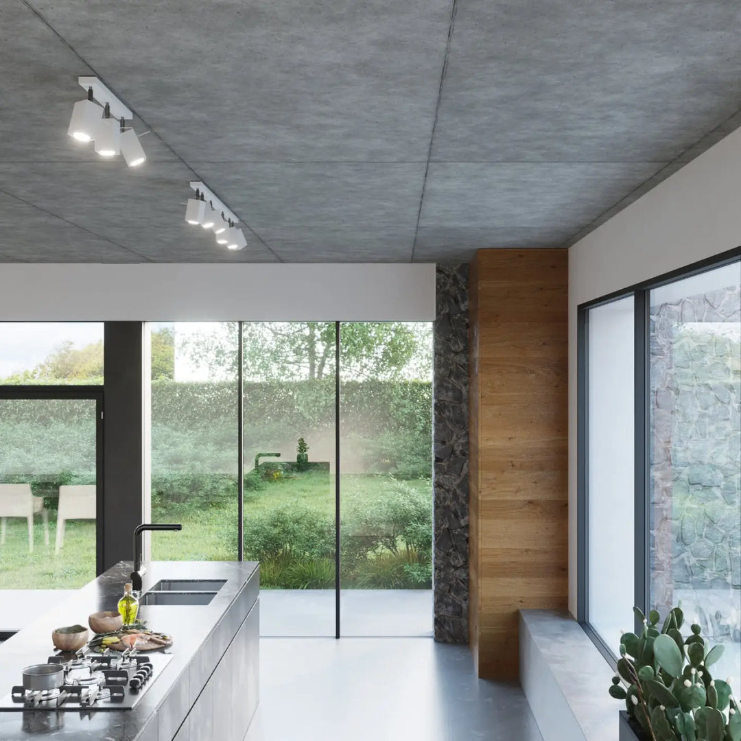 Applique murale merida blanc dans une cuisine moderne minimaliste avec plans de travail inox et plafond en béton