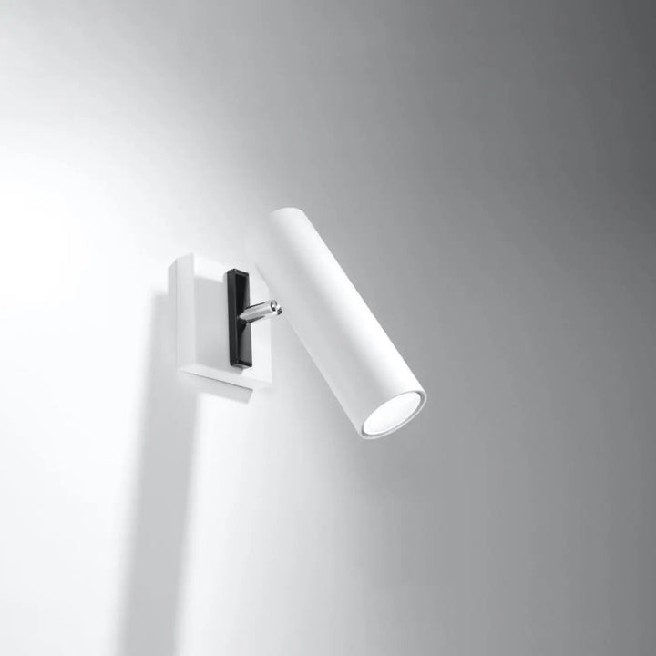Applique murale minimaliste blanche avec design cylindrique et détails noirs série direzione pour éclairage élégant