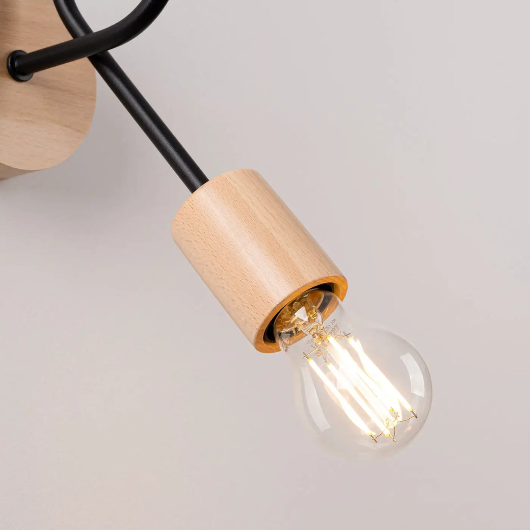 Applique murale lampe ember avec ampoule filament en verre clair et support en bois matériaux naturels et design moderne