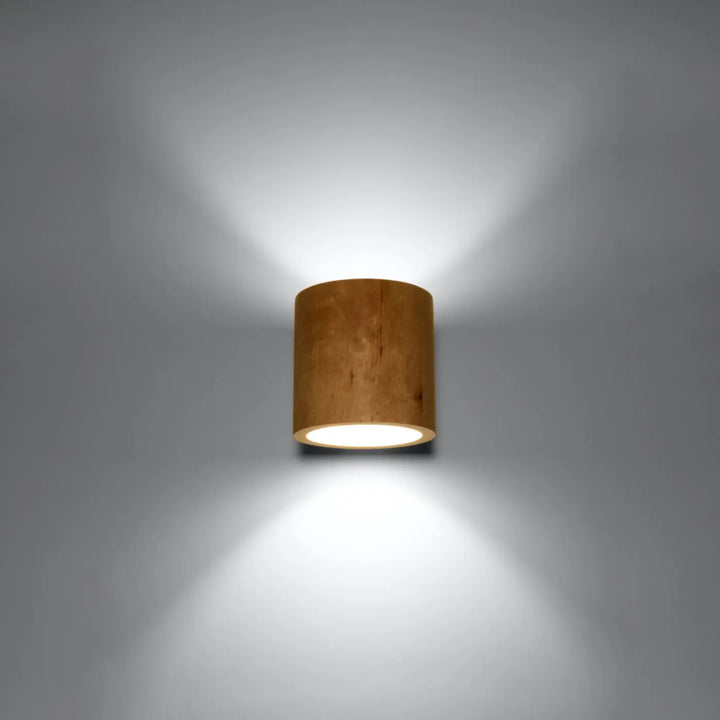 Applique murale orbis en bois naturel cylindrique avec finition chaleureuse et ambiance douce montées individuellement