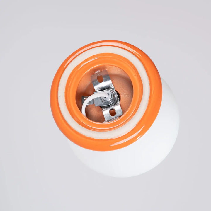 Base en céramique orange et blanche avec contacts métalliques pour lampe zori, belle décoration aux qualités esthétiques