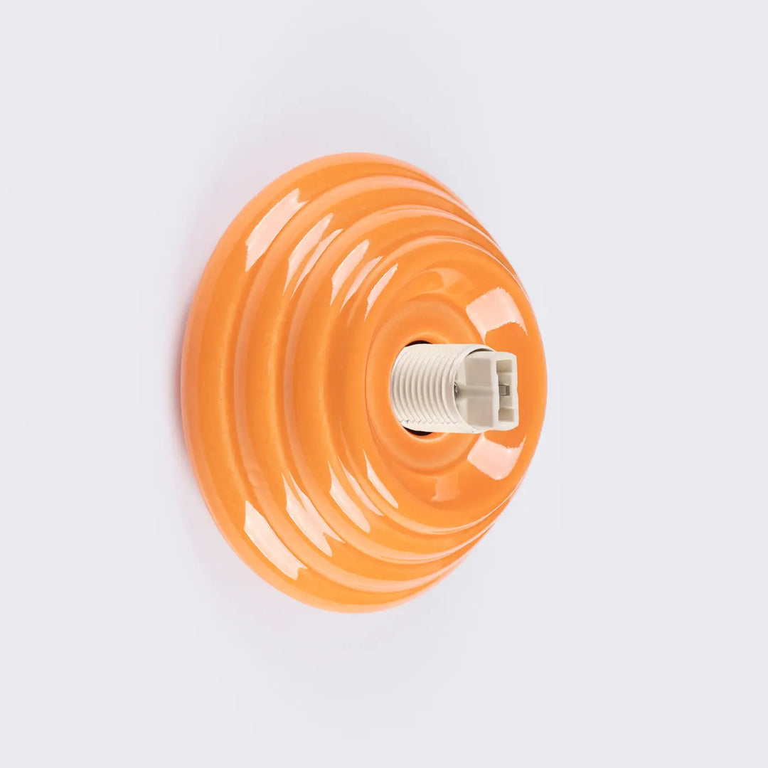 Applique murale lampe zori en céramique orange vive avec design concentrique et qualités esthétiques pour belle décoration