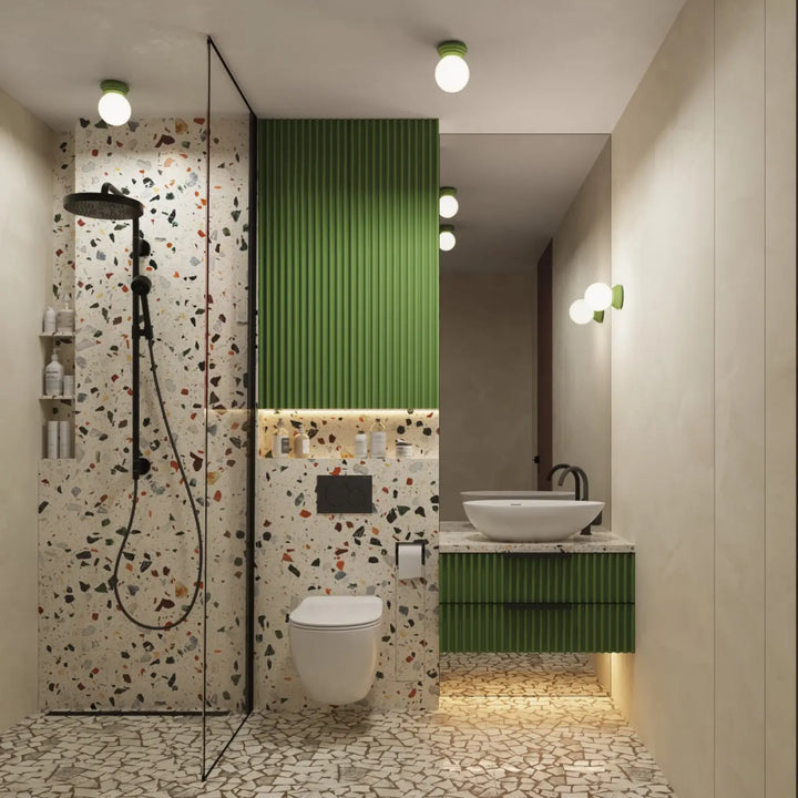 Applique murale lampe zori vert dans une salle de bain moderne avec terrazzo et belle décoration aux qualités esthétiques