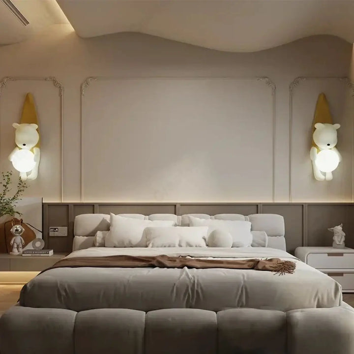 Applique murale kodan en forme dours crème avec lumières sphériques chaudes émettant une lueur douce