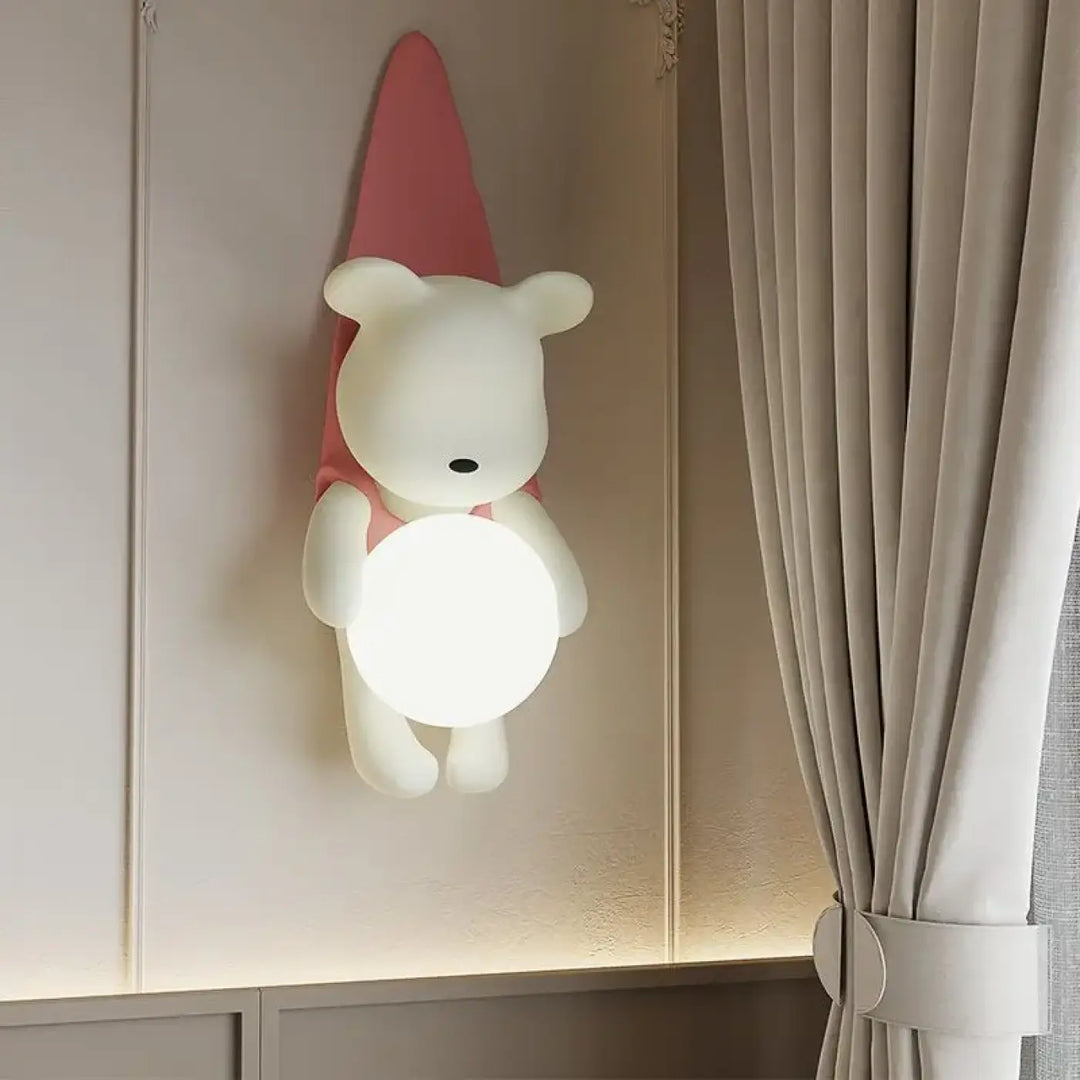 Applique murale kodan en forme dours blanc avec chapeau rose pointu et lumière sphérique lumineuse