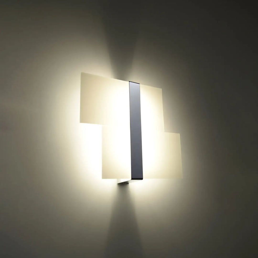Applique murale massimo chrome avec panneau noir vertical minimaliste diffusant une lumière chaude pour chambre à coucher design intemporel