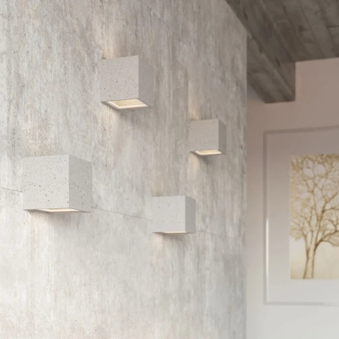 Applique murale leo en béton moderne blanche avec éclairage encastré pour une atmosphère harmonieuse laissez-vous surprendre
