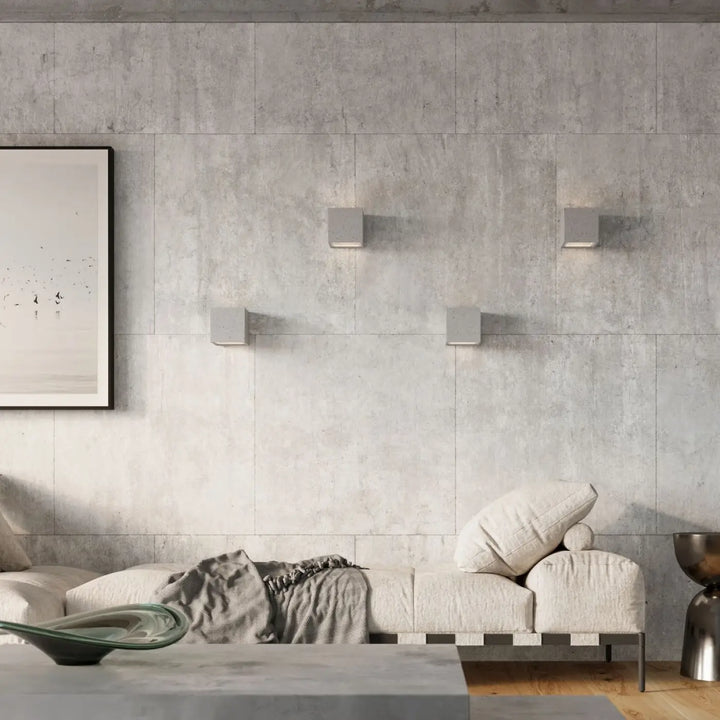 Applique murale leo en béton moderne avec finition gris mat pour créer une atmosphère harmonieuse laissez-vous surprendre