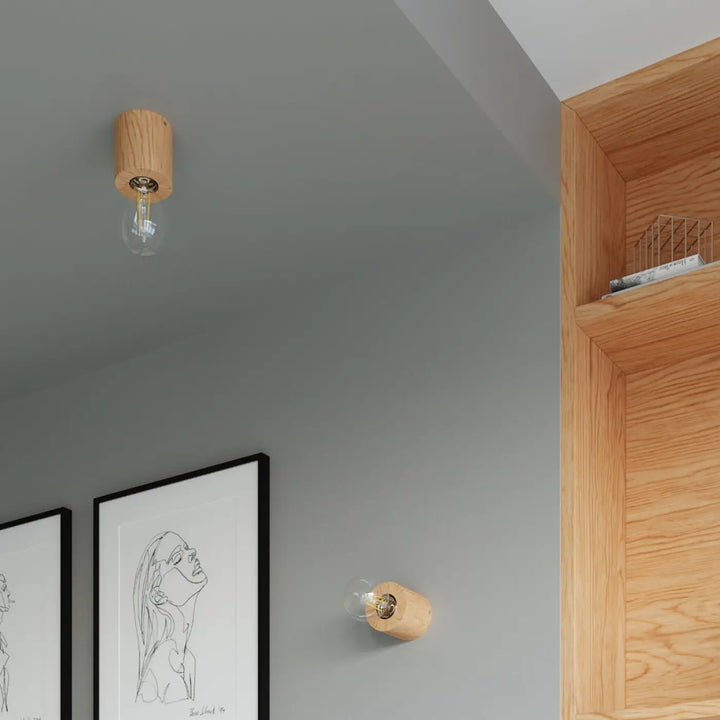 L’applique murale salgado en bois naturel avec finition chêne et ampoule style edison pour type loft minimaliste