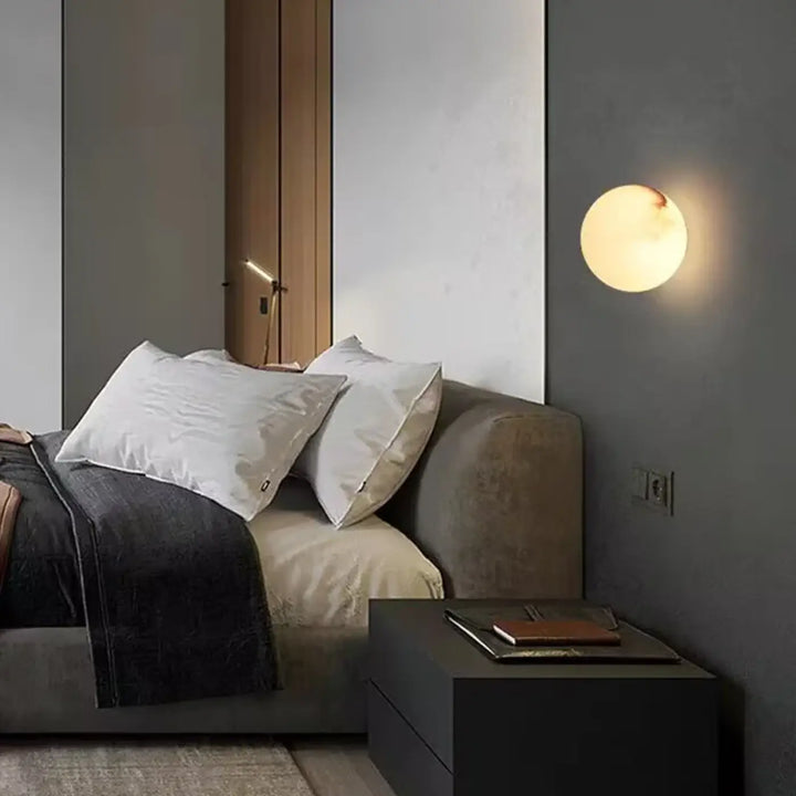 Applique murale kesto circulaire avec halo lumineux apaisant en design moderne et lumière chaude douce