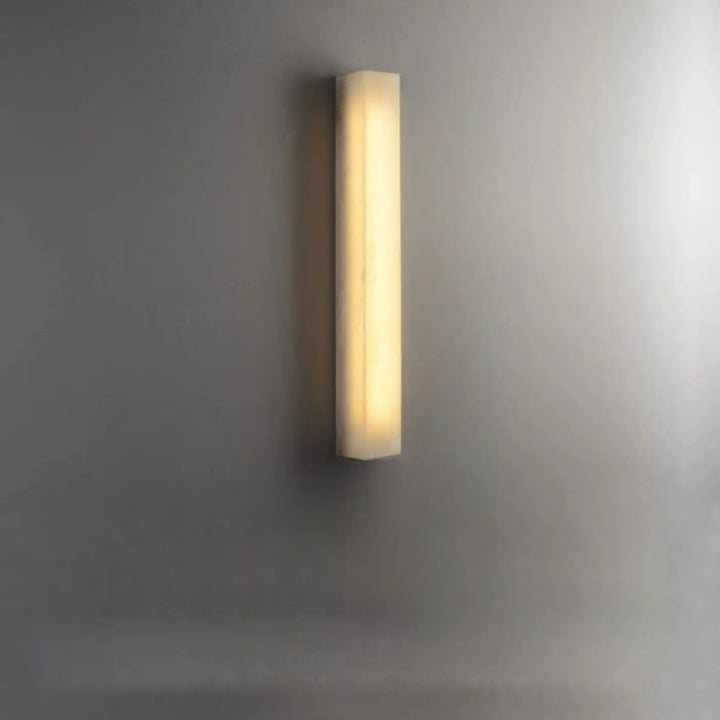 Applique murale stelia rectangulaire avec finition translucide ivoire et lumière douce, ampoules sont-elles incluses