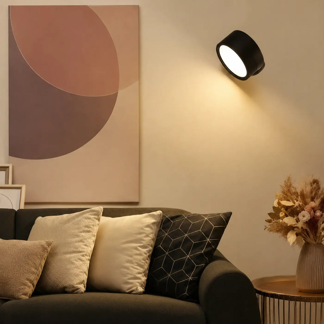 Applique murale lunis noire cylindrique avec faisceau lumineux précis pour un éclairage murale contemporaine