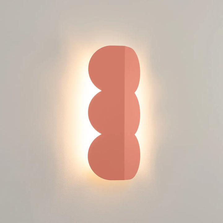 Applique murale biscuit peach avec forme ondulée caractéristique compose d’une lampe luminaires biscuit allient design moderne