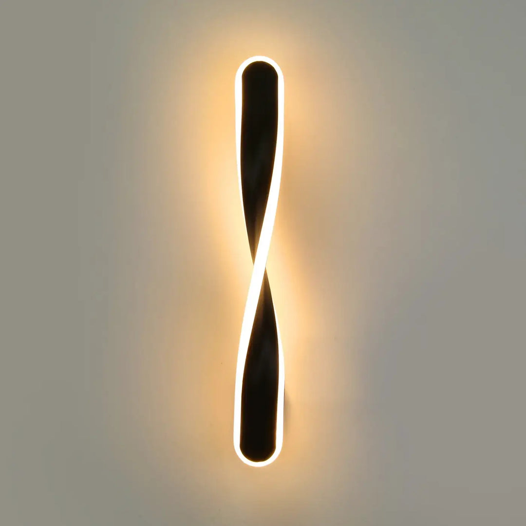 Applique murale laaka led noire et blanche avec design torsadée moderne pour éclairage intérieur élégant