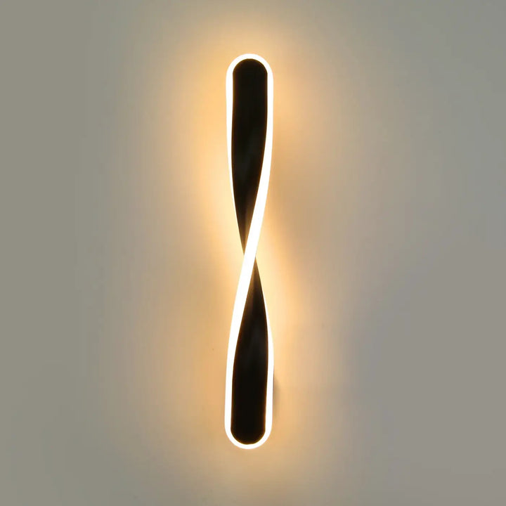 Applique murale laaka led noire et blanche avec design torsadée moderne pour éclairage intérieur élégant