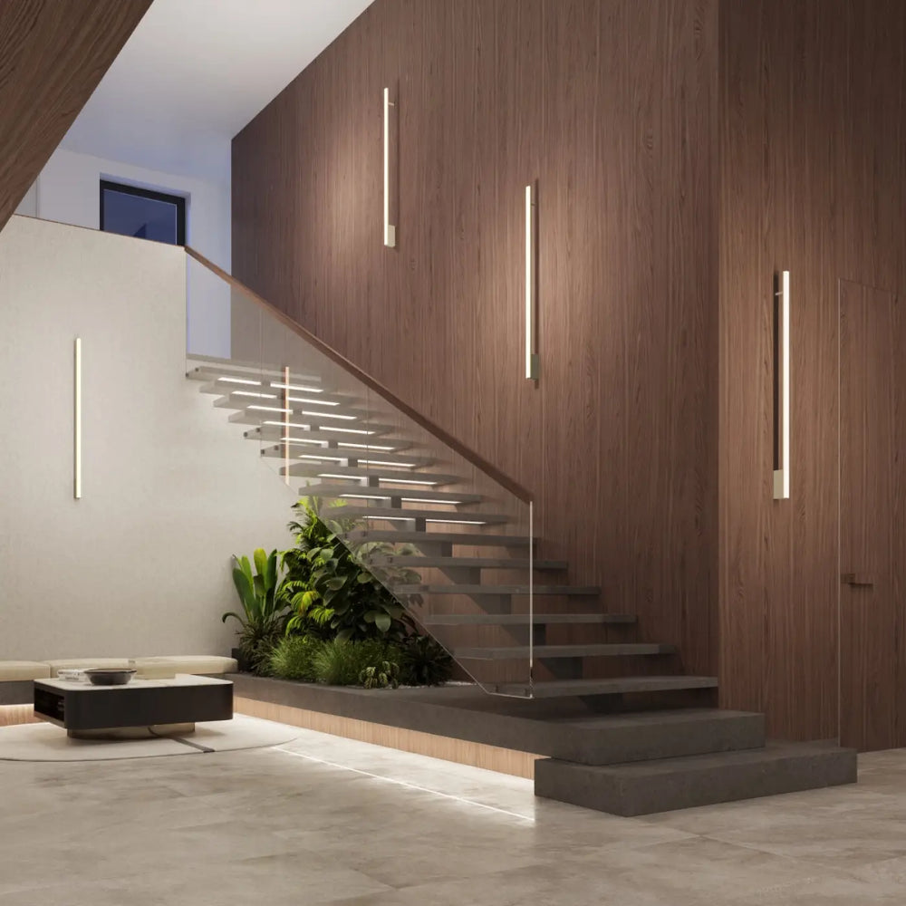 Applique murale lagom 120 3000k vert olive dans un design minimaliste avec escalier en béton et bois chaleureux, excellente finition collection lagom allie