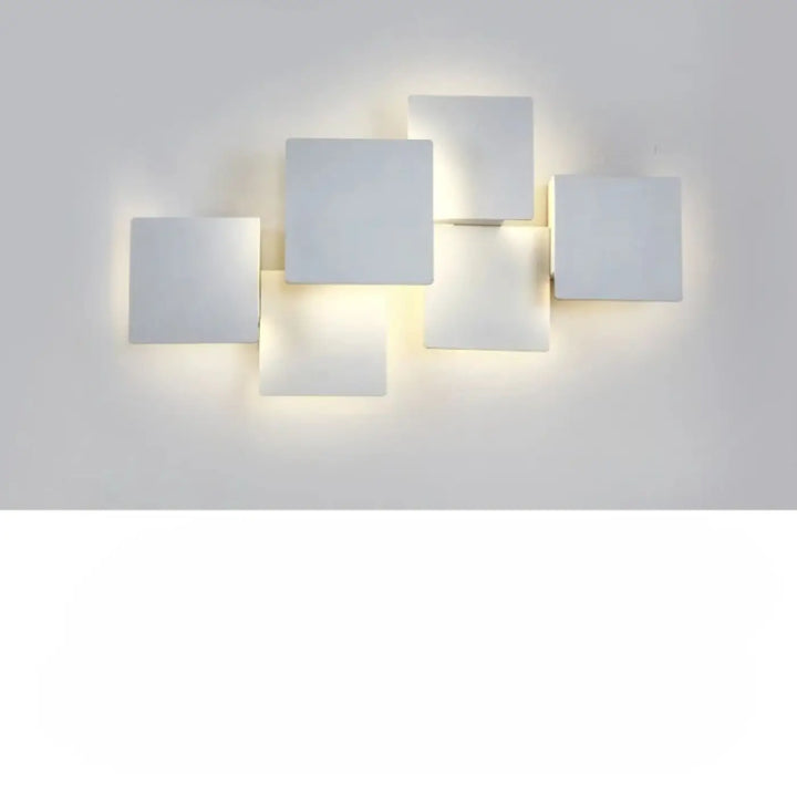 Applique murale kubora carrés flottants blancs avec effet lumineux minimaliste moderne en design carré