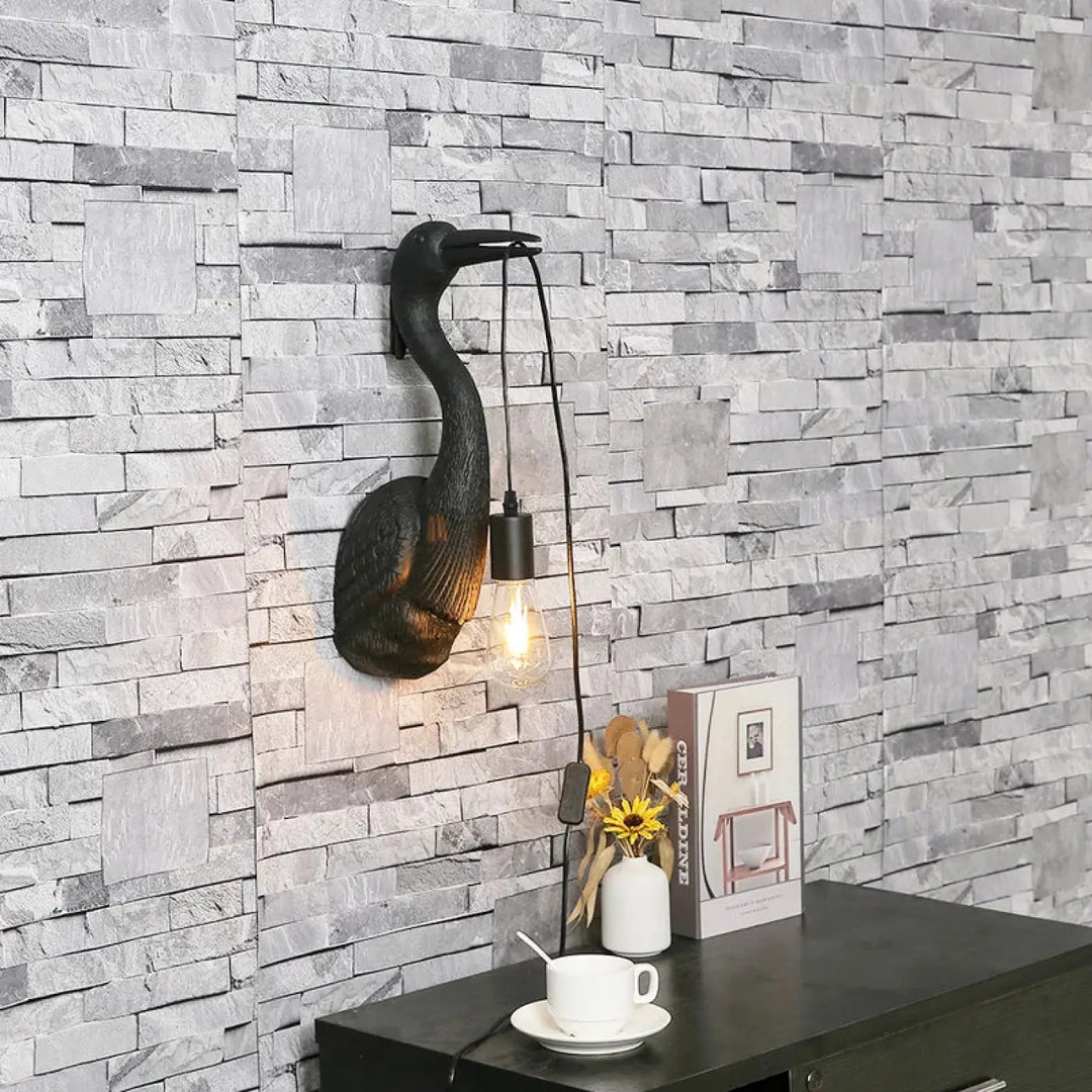 Applique murale noire en fer forgé en forme d’oie avec ampoule suspendue edison pour une touche artistique élégante