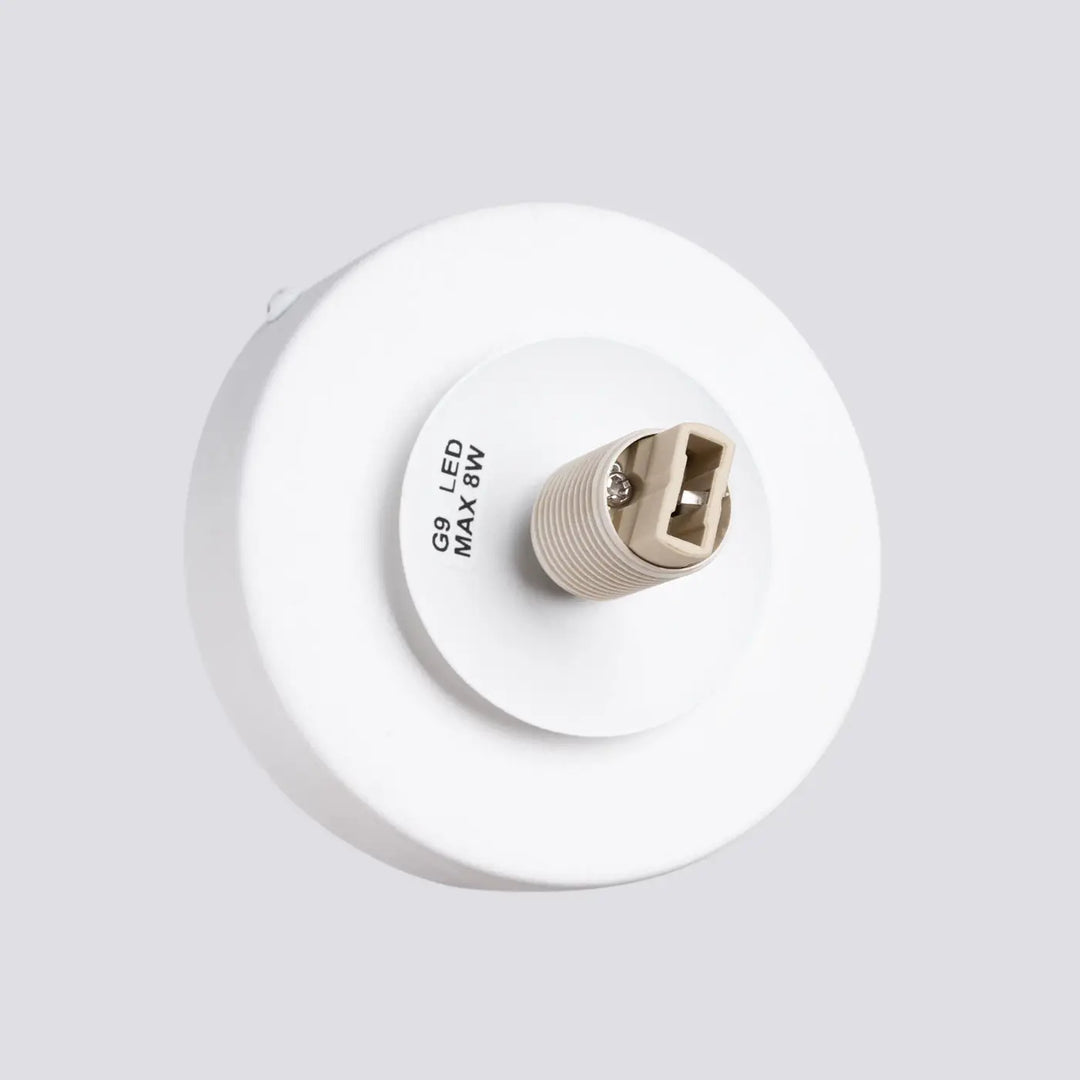 L’applique yoli blanche avec boîtier sphérique blanc et douille g9 led max 8w d’une élégance minimaliste