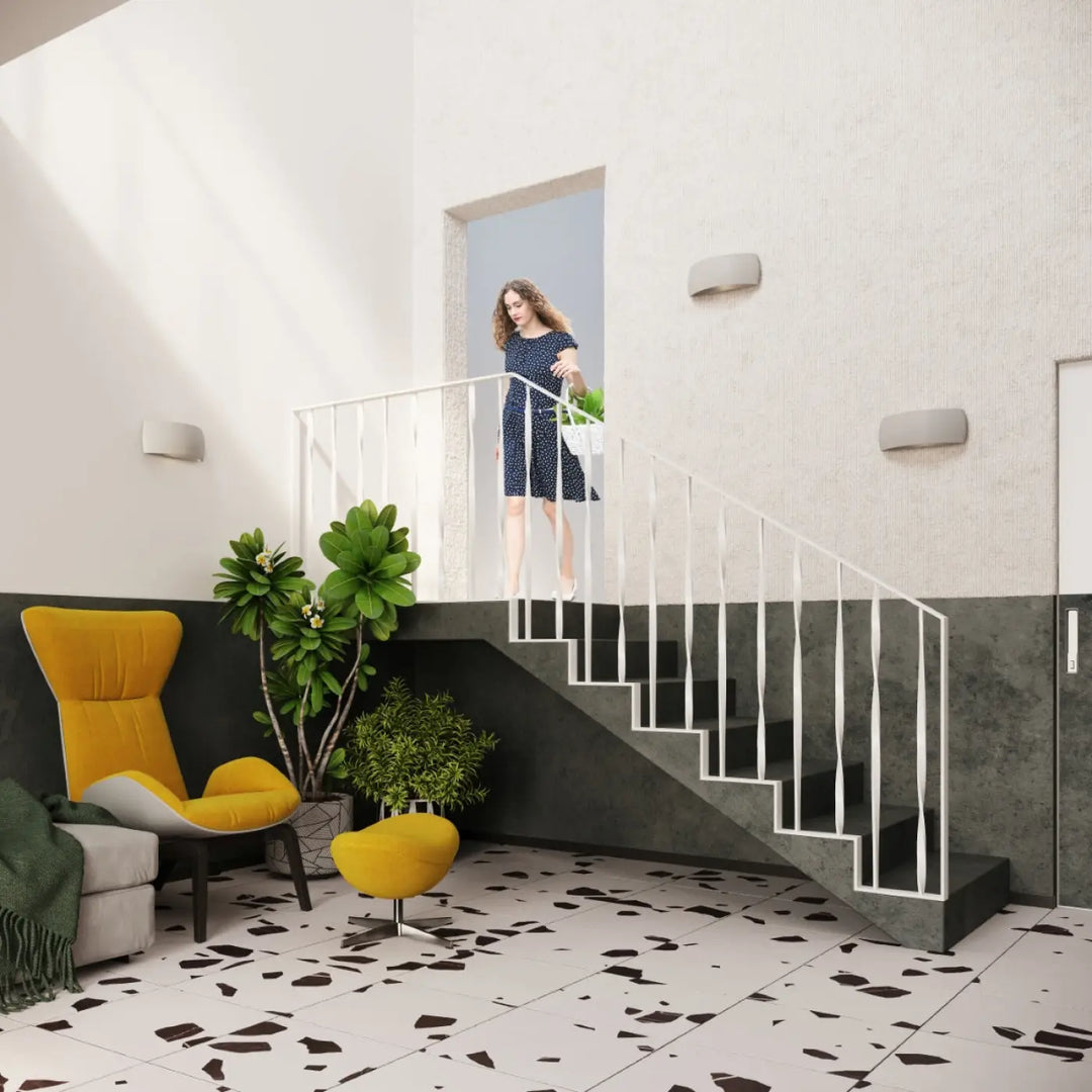 Une applique murale pontius en céramique gris avec un design moderne et un enduit structuré élégant