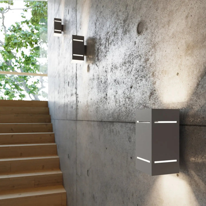 Applique murale blocco gris moderne avec perforation linéaire et spectacle lumineux à led horizontal