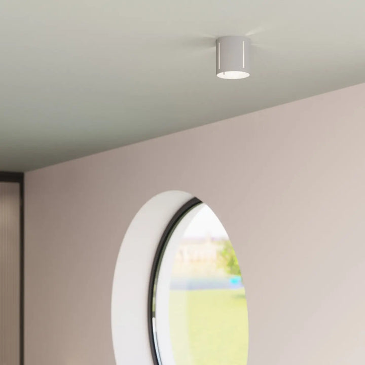 Applique murale moderne inez gris avec spotlight cylindrique blanc et perforation linéaire pour plafond