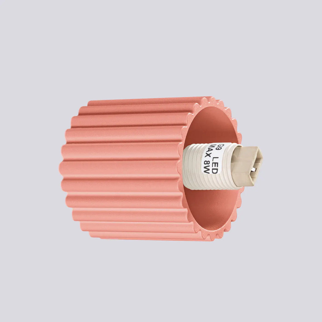 Applique murale halo en plastique ondulé rose avec base beige et étiquette blanche idéale pour bureau décorative