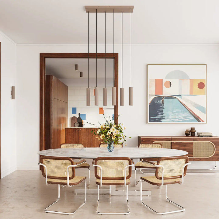 Applique murale ivar led 3000k taupe proche d’une table ovale en marbre avec design expressif et confort d’utilisation