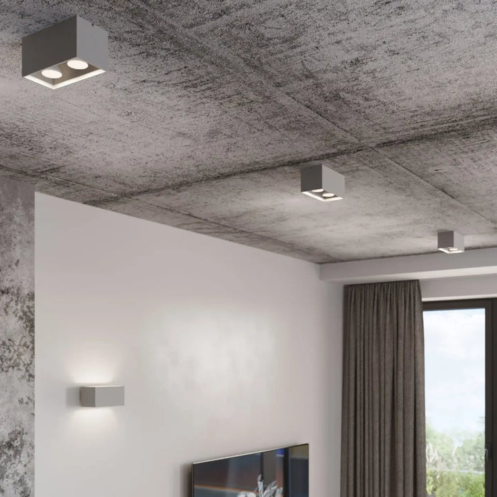 Applique murale quad maxi noire avec deux ampoules intégrées finition mate idéale pour bois naturel contemporain