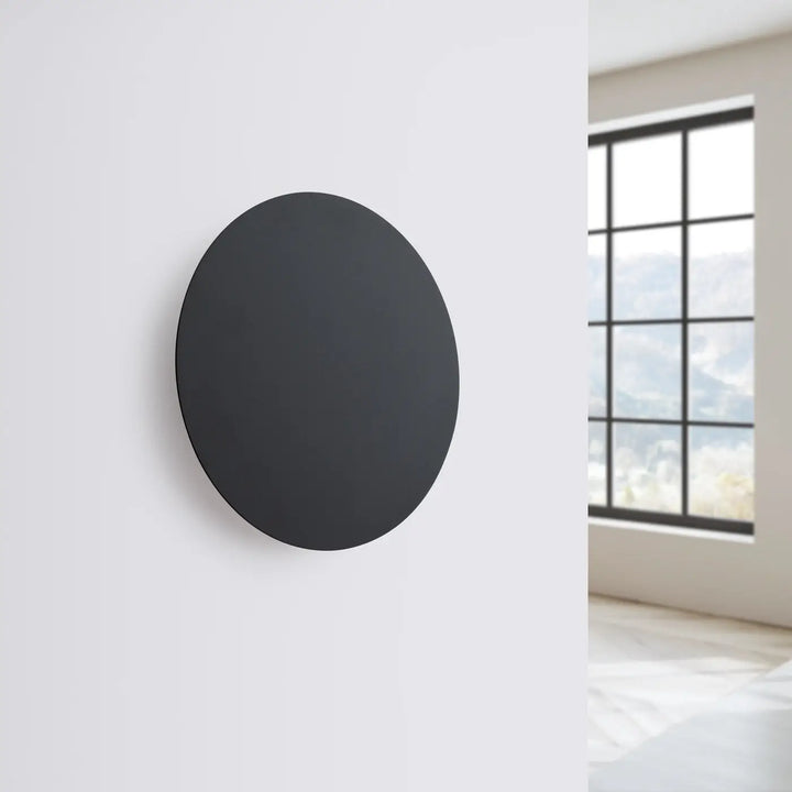 Applique murale noire ronde borgen 3000k en métal, idéale comme seule applique murale dans une déco moderne