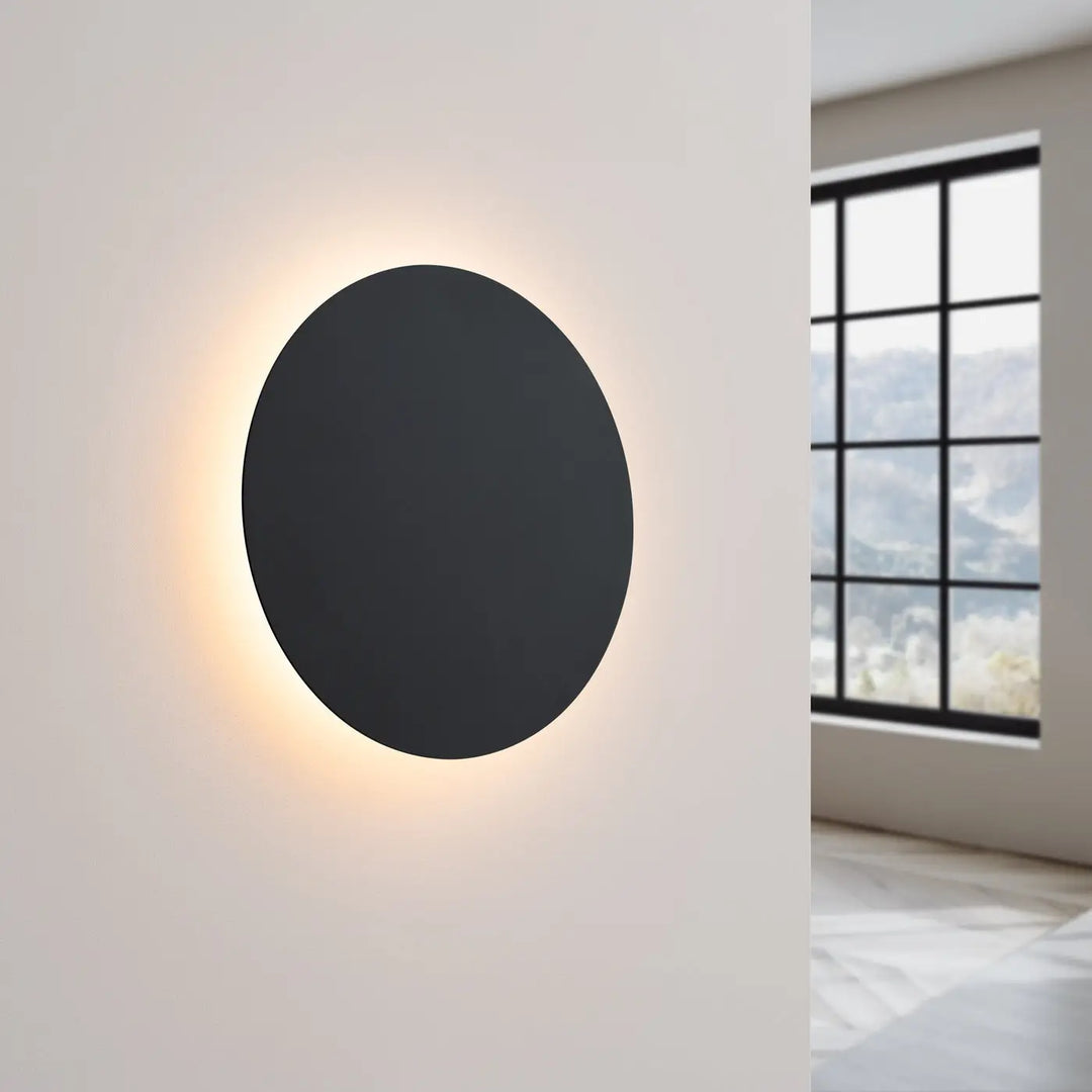Applique murale seule noire borgen 3000k avec design circulaire moderne et éclairage d’ambiance chaud