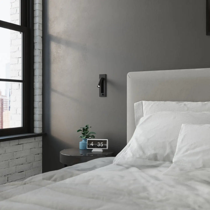 Applique murale minimaliste série enif noire avec tête ajustable et éclairage élégant au fini métallique