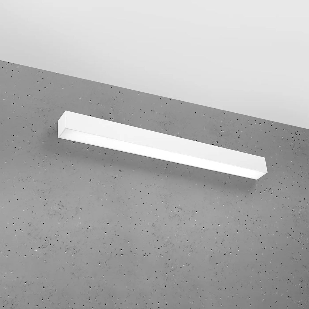 Applique murale pinne 67 3000k blanc rectangulaire en led montée sur mur en béton avec module led et paramètres d’éclairage