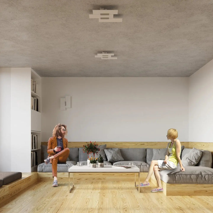 Sectionnel gris avec cadre en bois et coussins gris blanc met magnifiquement en valeur le design intemporel fabiano