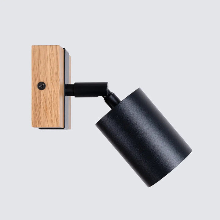 Applique murale fager 1 noir avec boîtier moderne en cylindre noir et abat-jours orientables sur plaque en bois